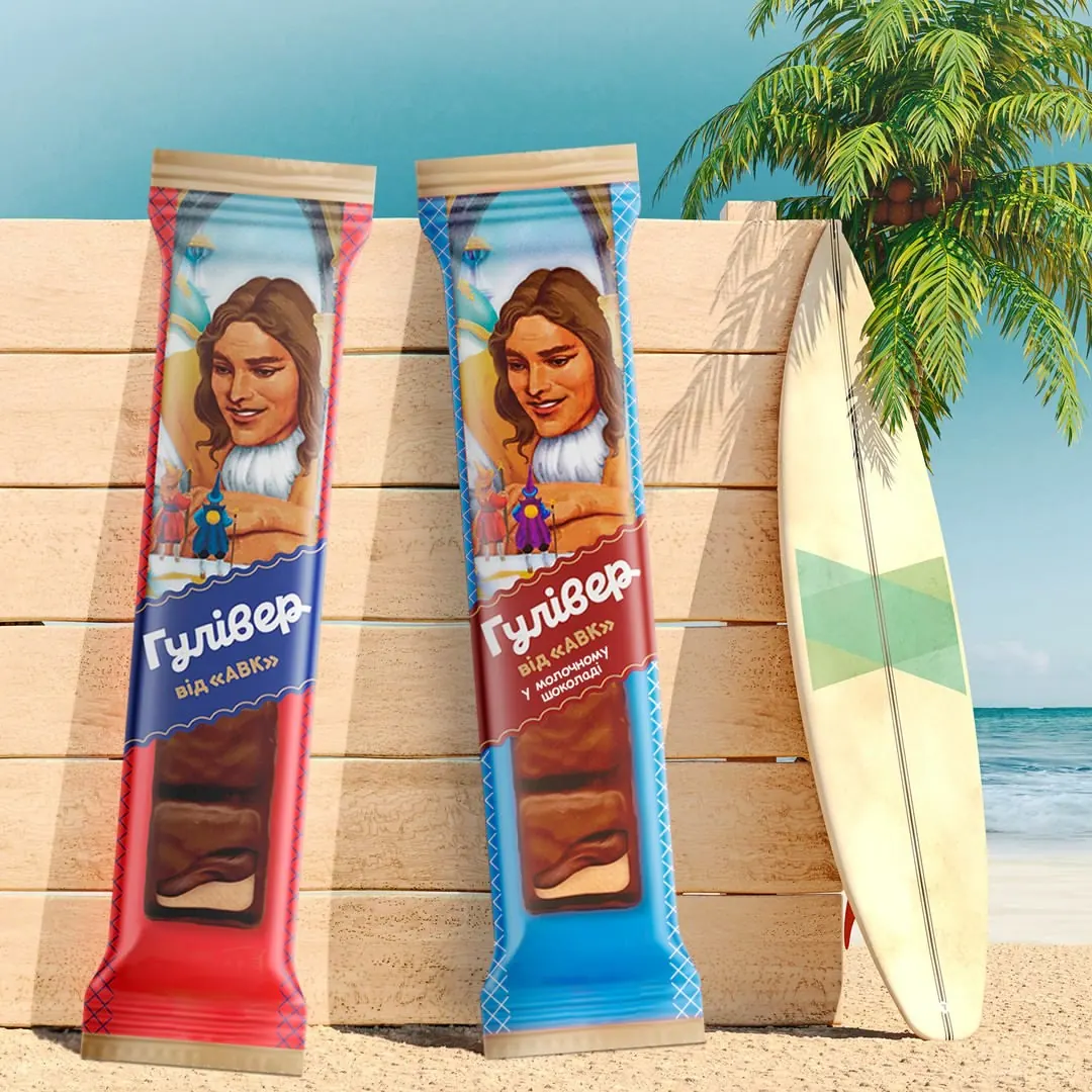 Gulliver chocolate bars leaning on a beach fence next to surfboards